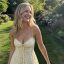 A smiling blonde woman